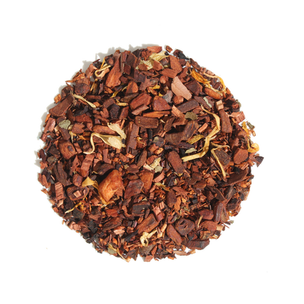 A scoop of Plum Deluxe Apple Butter herbal tea, loose leaf
