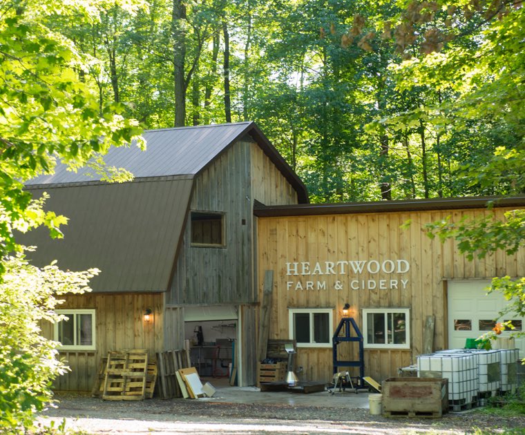 The Heartwood Farm & Cidery building in the woods